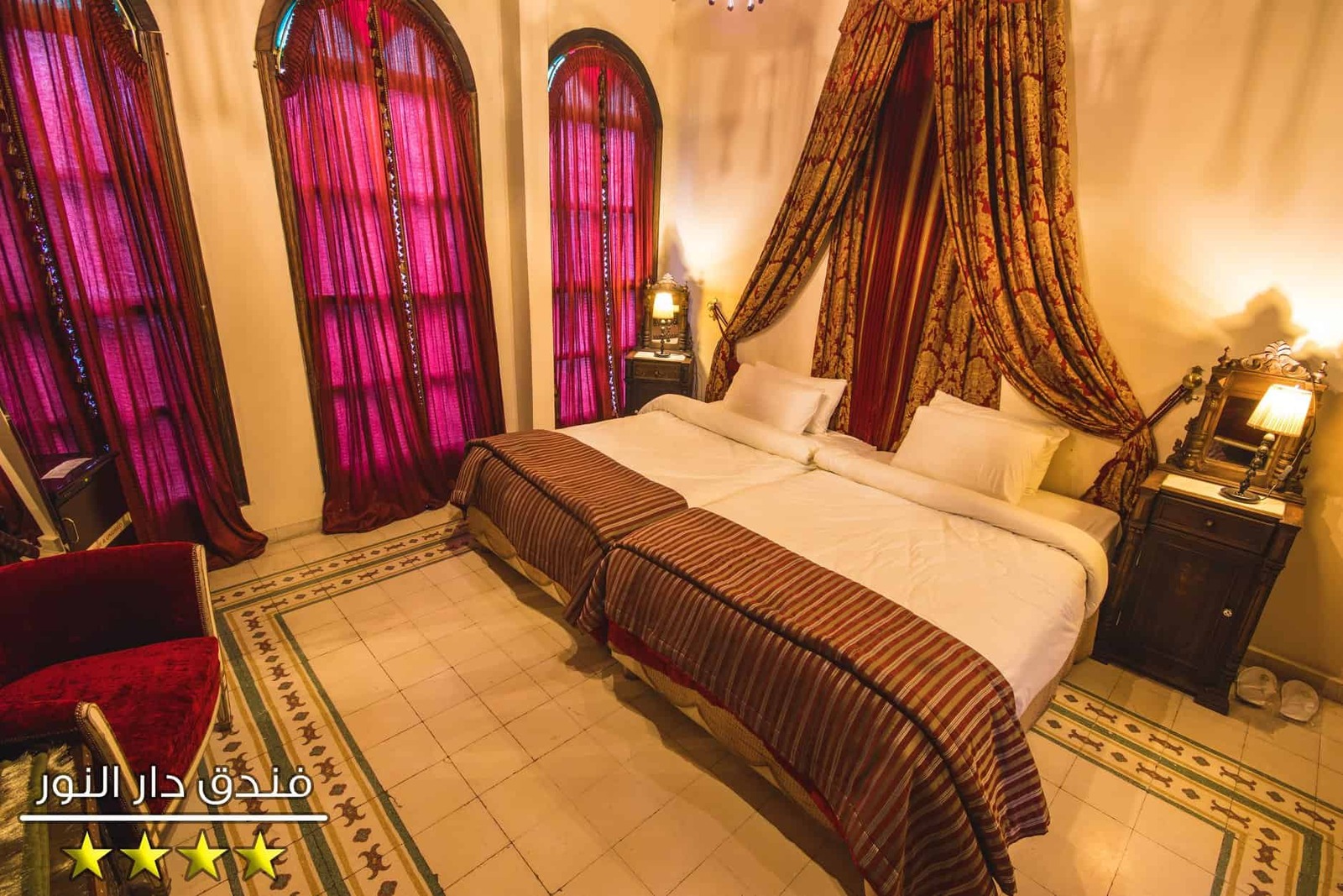 Dar Al Noor Hotel courtyard with seating