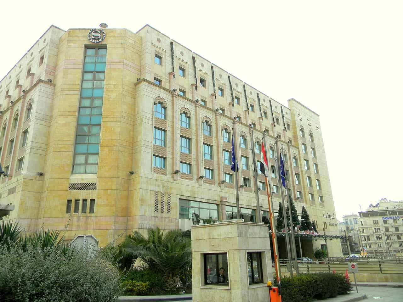 Sheraton Aleppo Hotel exterior and pool area