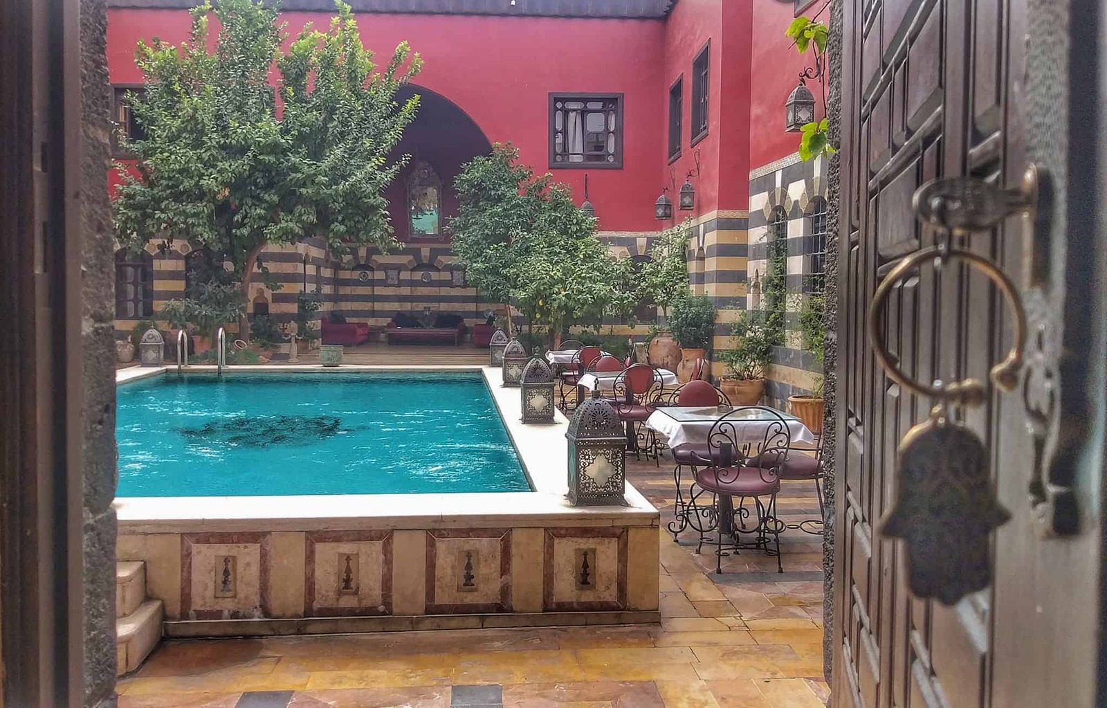 Talisman Hotel swimming pool in courtyard garden